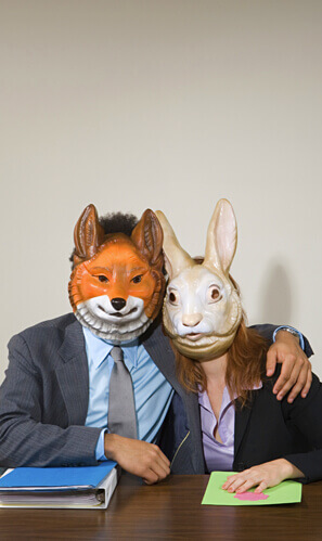 Office workers fooling around in masks
